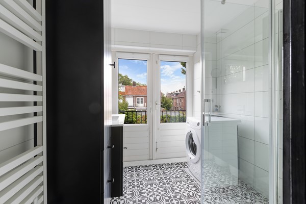 Foto - Te koop: Sfeervolle tussenwoning met groene oase!